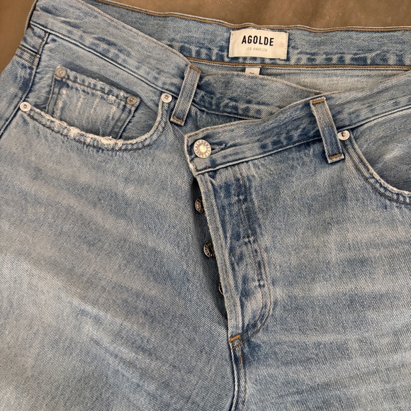 Agolde Denim - Agolde criss cross oversized light colored jeans.